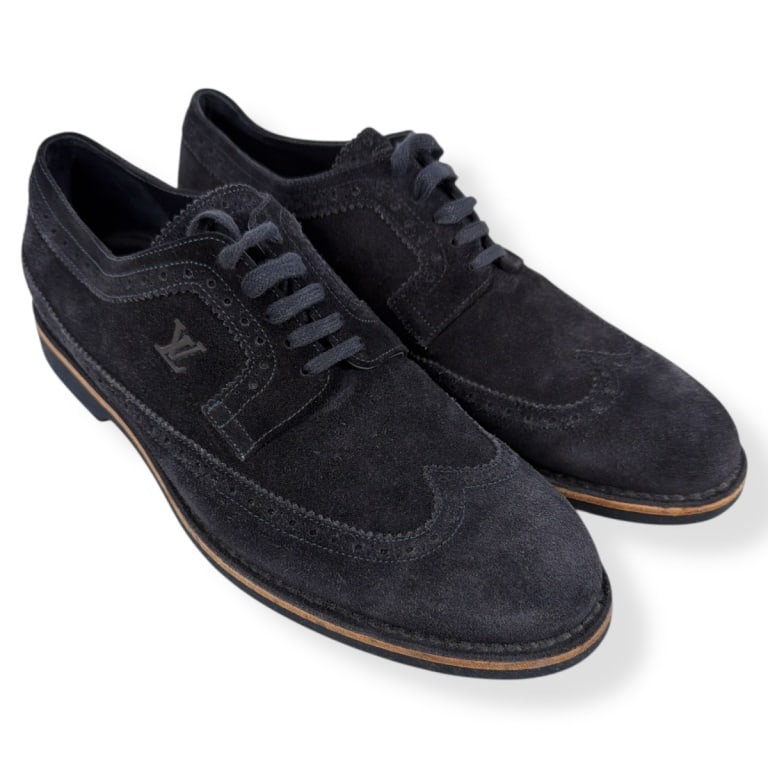 Pair Louis Vuitton LV Navy Suede Brogues size 6.5: Pair Louis Vuitton LV Navy Suede Brogues with dust bag. Size 6-1/2. Condition: Good, well cared for with wear consistent with use. Estimate 200 - 400 Domestic shipping Third Party