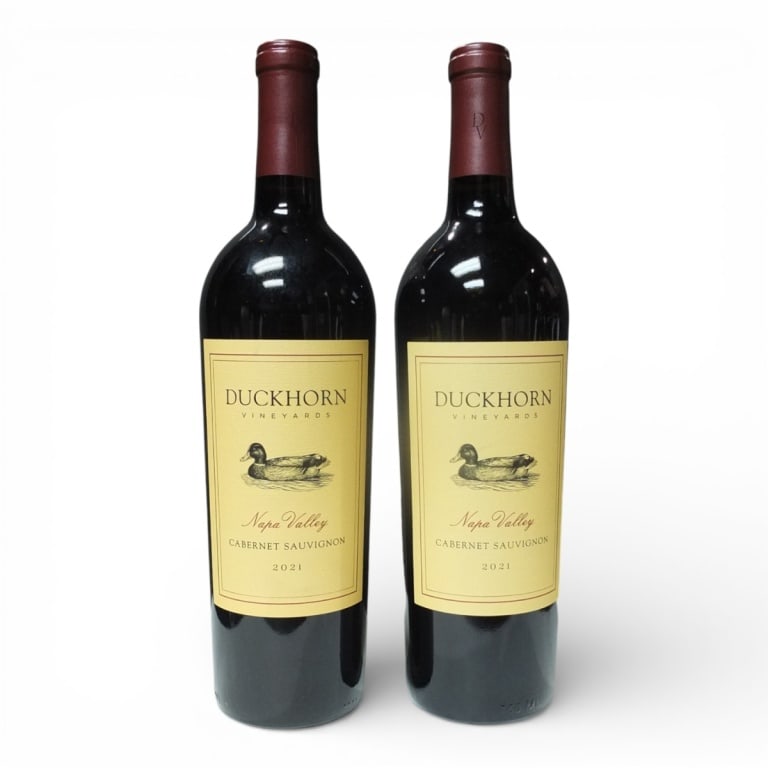 (2) Duckhorn 2021 Napa Valley Cabernet Sauvignon: (2) Duckhorn 2021 Napa Valley Cabernet Sauvignon, 750ml Bottles. Offered from a South Florida Private Collection. Bidders are purchasing the bottle and its historically significant, unbroken tax stamp