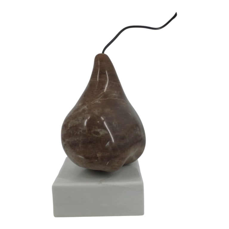 Large Polished Stone Pear Sculpture on Marble Base: Large Polished Stone Pear Sculpture on Marble Base. Initialed CS or A. Measures 18" H including stem x 7-1/2" x 7" at base. Condition: Good condition. Estimate 200 - 400 Domestic shipping Third Party