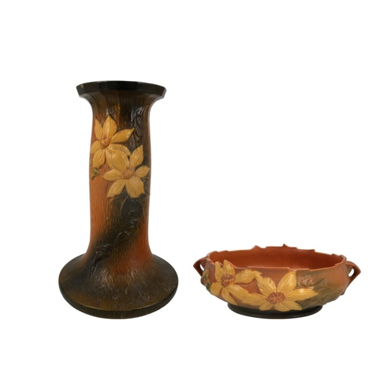 Roseville #6-10 Pottery Jardiniere w/ Pedestal: Roseville #6-10 clematis pottery jardiniere with associated pedestal. Both items are properly marked. Jardiniere measures 4-1/4", 13-1/2" (w/ handles). Condition: Pedestal has a restoration to the rim