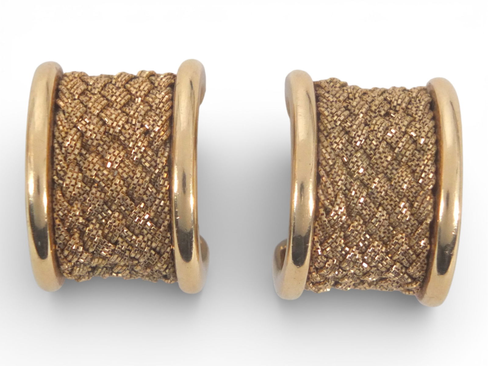 Pair of 14K Clip on Earrings: Pair of 14 Karat Yellow Gold Clip on Earrings. Stamped 14K. Measures 3/4", 5/8". Approx. weight: 23.3 grams. Condition: Good condition. Estimate 2000 - 3000 Domestic shipping Third party