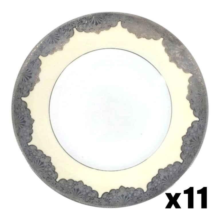11 Lanternier Limoges Silver Overlay Dinner Plates: 11 Antique Limoges Lanternier Silver Overlay Dinner Plates. Stamped on bottom. Measures 10-3/4". Condition: Typical wear to edges or in good antique condition. Estimate 200 - 400 Domestic shipping