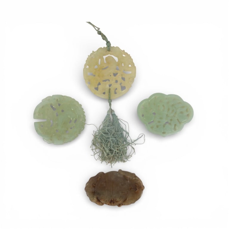 4 Vintage Chinese Carved Jade Pendants: 4 Vintage Chinese Carved Jade Pendants. Unsigned. Largest measures 2-1/4" diameter. Condition: Good condition. Estimate 200 - 400 Domestic shipping Third Party