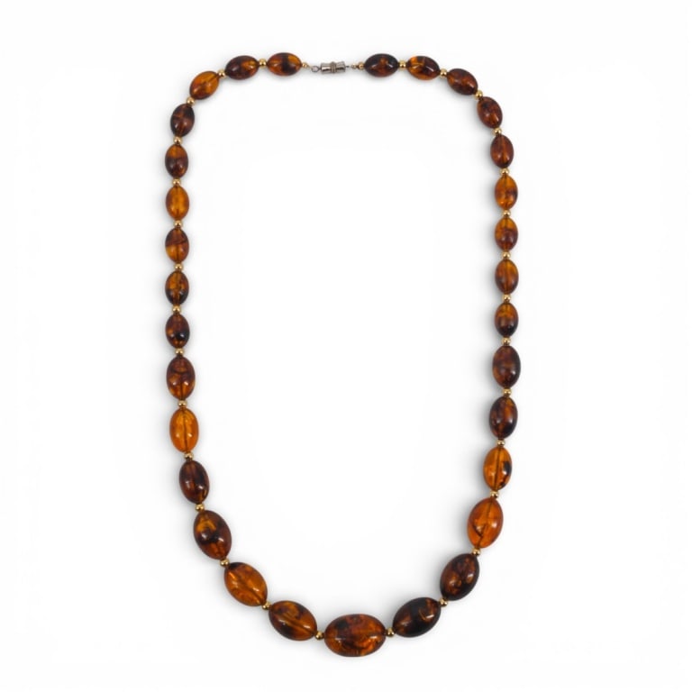 Vintage Baltic Amber Bead Necklace: Vintage Baltic Amber Graduated Bead Necklace. Unsigned. Measures 29" L, beads 25mm - 12mm. Weighs approx. 66 grams. Condition: Good condition. Estimate 100 - 300 Domestic shipping Third Party