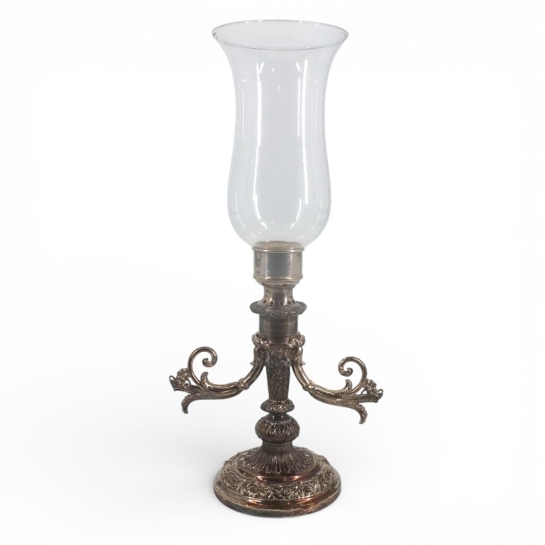 Antique Heavy Silver Plate Hurricane Candle Holder: Antique Heavy Silver Plate Hurricane Lamp/Candle Holder. Baluster shaped shaft with decorative scroll work arms. No visible signature. Measures 21-1/2" H overall including shade x 10-1/4" W. Glass mea