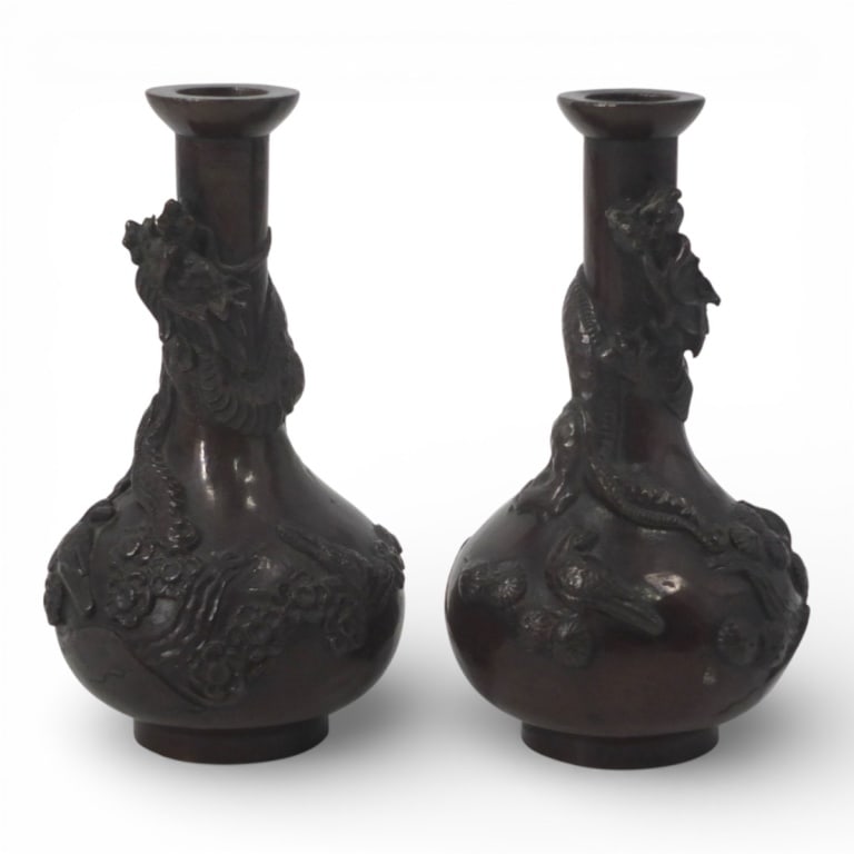 Pair Vintage Japanese Bronze Dragon Vases: Pair Vintage Japanese Patinated Bronze Dragon Vases. Unsigned. Measures 6" H. Condition: Good condition. Estimate 150 - 250 Domestic shipping Third Party