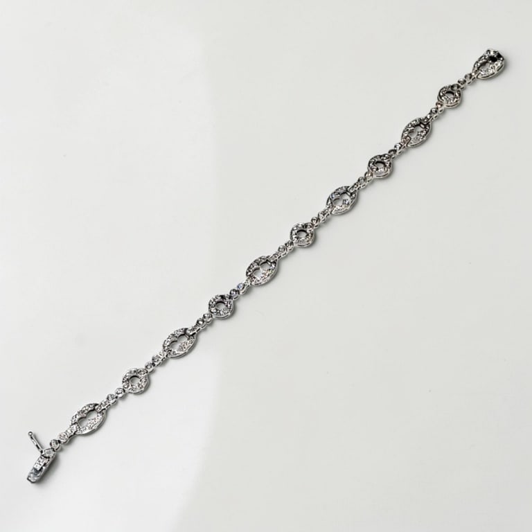 Vintage 14K Diamond Bracelet: Vintage 14 Karat White Gold and Diamond Bracelet. Diamond: approx. 2.00 tcw. Measures 7-1/4" L. Approx. weight: 12.1 grams. Condition: Good condition. Estimate 2000 - 3000 Domestic shipping Third