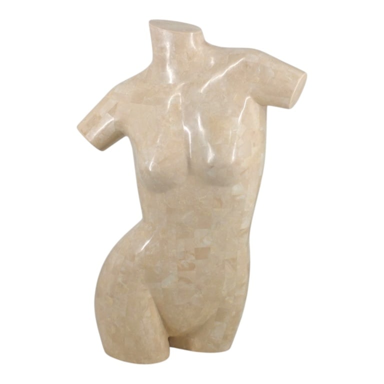 Tessellated Stone Female Torso Sculpture: Circa 1980s Tessellated Stone Female Torso Sculpture. Comprised of man-made material. Unsigned. Measures 28" H x 19-1/2" W. Condition: Good condition. Estimate 200 - 1000 Domestic shipping Third Party