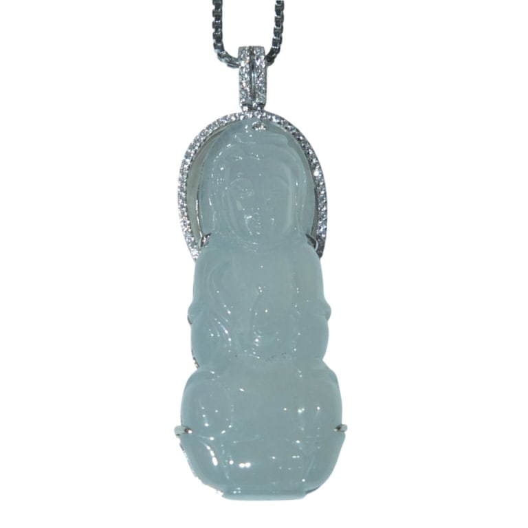 Vintage 18K Diamond and Jade Buddha Necklace: Vintage 18 Karat White Gold Diamond and Jade Buddha Necklace. Approx. 0.16 TCW diamond. Pendant measures 2". Approx. weight: 13.6 grams. Condition: Good condition. Estimate 2000 - 3000 Domestic