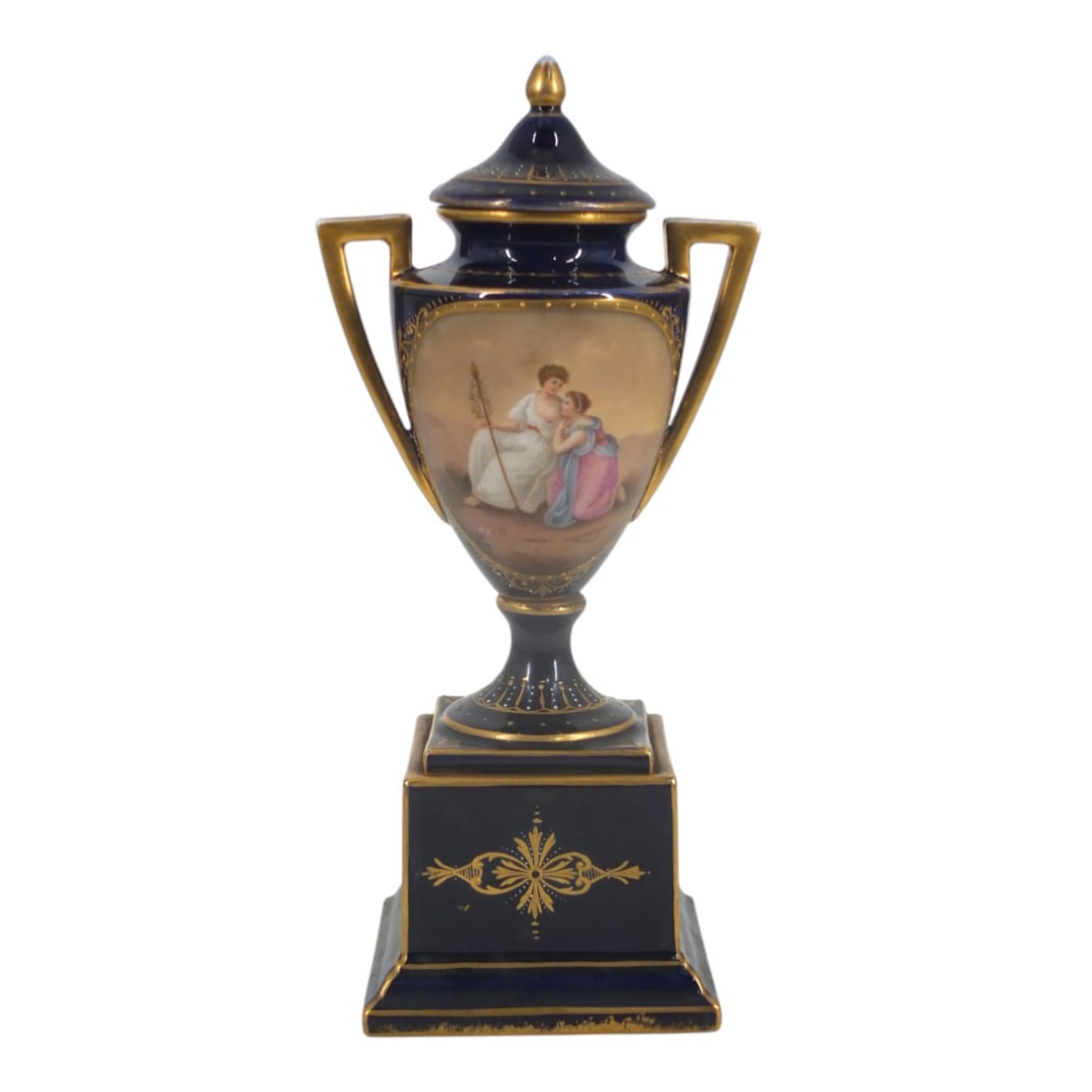 Royal Vienna Painted Porcelain Bolted Urn: Royal Vienna Hand-Painted Porcelain Miniature Bolted Urn. Classical motif on cobalt ground with gilt highlights. Fully signed on bottom. Measures 10-1/2" H. Condition: Typical wear or in good conditio