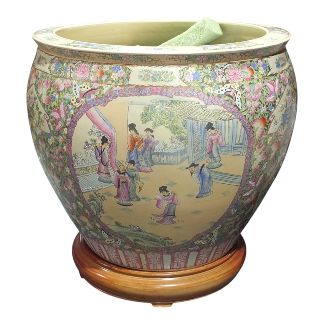 Vintage Large Chinese Famille Rose Jardiniere: Vintage Large Chinese Famille Rose Jardiniere with Wood Stand. Decorated with a floral motif with court scene vignettes. Measures 25" H x 28-1/2" W. Condition: Good condition. Estimate 400 - 800