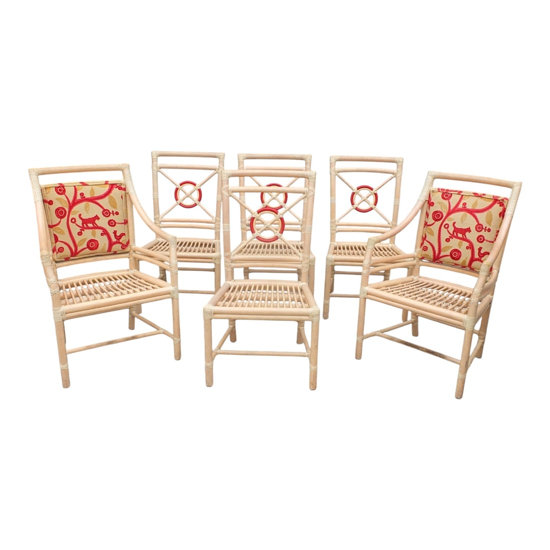 (6) McGuire Bamboo Target Back Dining Chairs: Set of Six McGuire Bamboo Target Back Dining Chairs with Associated Upholstered Seat Cushions. Factory label on the base. Includes (2) armchairs and (4) side chairs. Measures 36" x 20-1/4", 16" seat