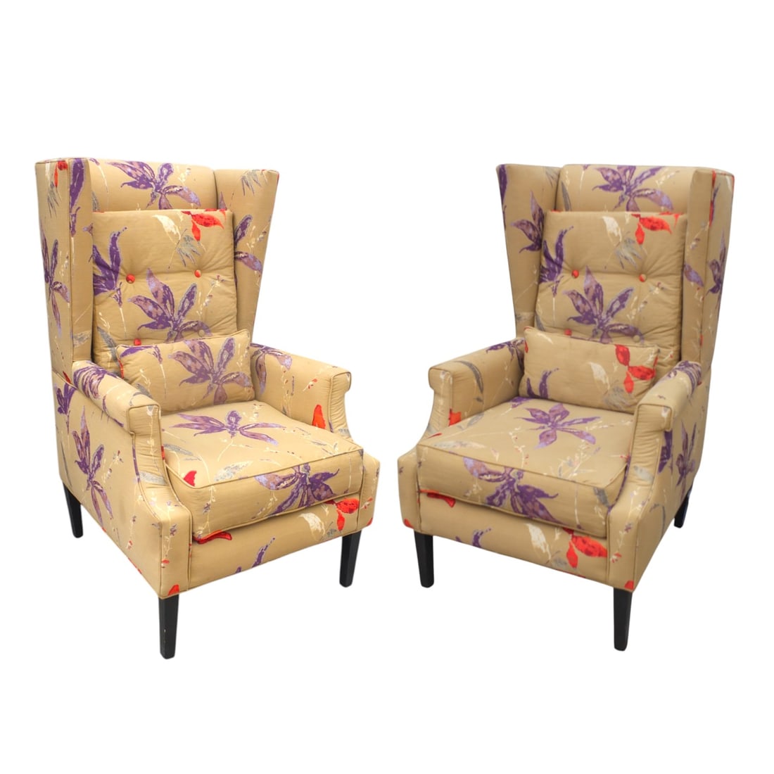 Pair of 1970s Wing Back Armchairs: Pair of 1970s Floral Upholstered Wing Back Armchairs with Cushions and Pillows. Measures 46-1/2 x 26, 20" seat height. Condition: Good condition. Estimate 400 - 600 Domestic shipping Third party