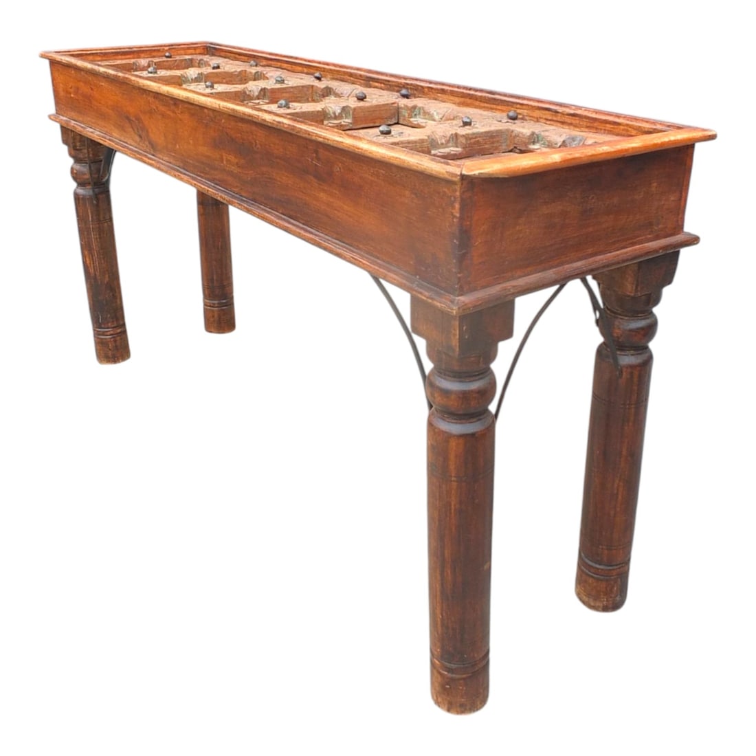 Antique Haveli Indian Door Console Table: Antique Haveli Indian Hand Crafted Door Presented as a Console Table with Iron Mounts. Measures 34" x 66" x 19". Condition: Typical scuff and scratches to the wood. Estimate 400 - 800 Domestic shippin
