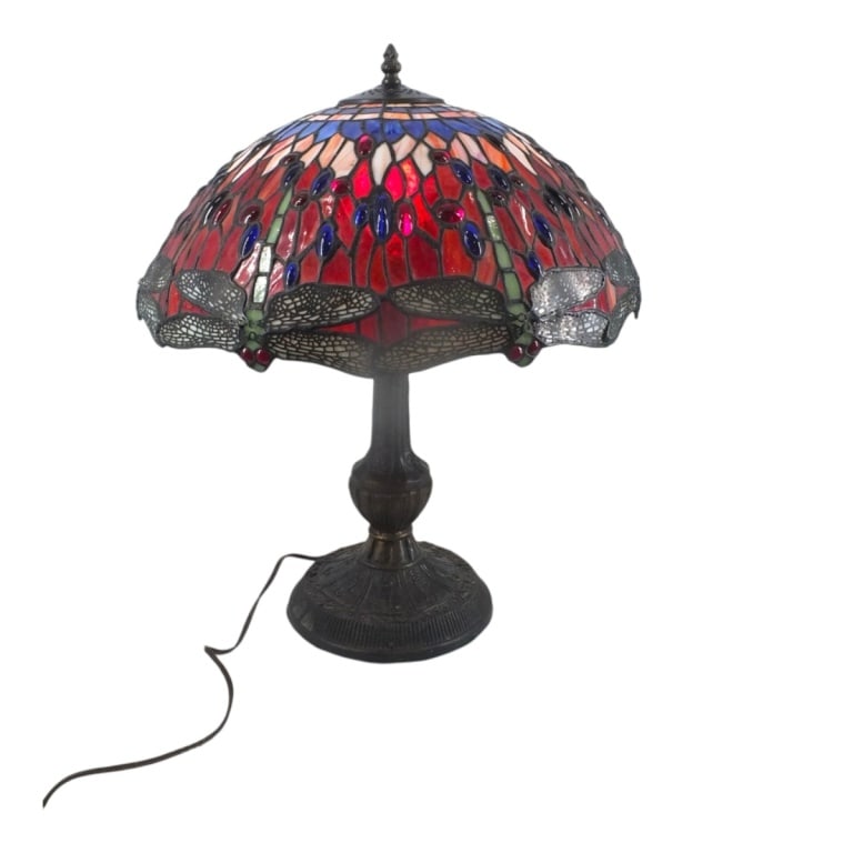 Tiffany Style Dragonfly Leaded Glass Lamp: Tiffany Style Dragonfly Leaded Glass Lamp. Unsigned. Measures 21" H, shade 8-1/2" H x 17-1/2" diameter. Condition: One edge with a few hairlines and a bit of a shallow bend or in good vintage conditio