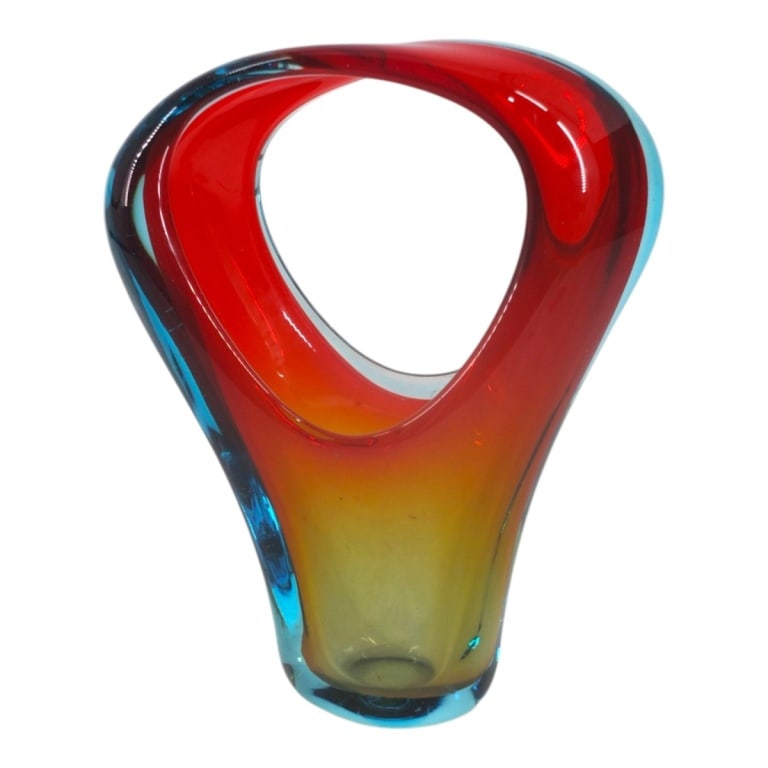 Mid-Century Murano Sommerso Basket Vase: Mid-Century Murano Sommerso Art Glass Basket Vase. Unsigned. Measures 8" H x 7" W x 2-1/2" D. Condition: Good condition with no chips or cracks. Estimate 100 - 1000 Domestic shipping Third Party