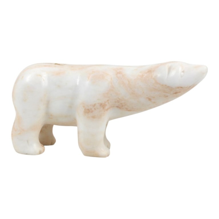 Vintage Carved Alabaster Polar Bear Sculpture: Vintage Carved Alabaster Polar Bear Sculpture. Unsigned. Old Bloomingdales sticker affixed. Measures 5-1/2" H x 11" L. Condition: Good condition. Estimate 100 - 1000 Domestic shipping Third Party