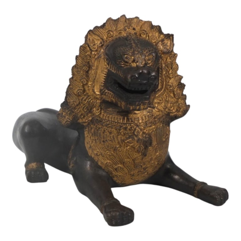 Patinated Bronze Thai Singha Foo Lion Figure: Vintage Patinated Bronze Thai Singha Foo Lion Figure with Gilt Highlights. Unsigned. Measures 8" H x 10" x 6". Condition: Good condition. Estimate 100 - 300 Domestic shipping Third Party