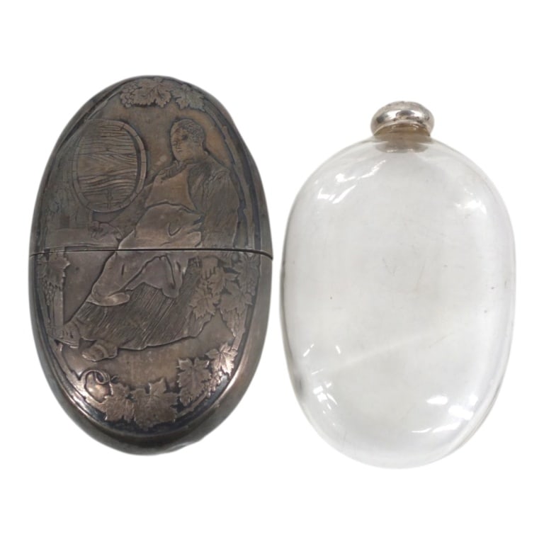 Antique Silver & Glass Drunken Monk Oval Flask: Antique 19/20 C Silver & Glass Drunken Monk Oval Flask. With detailed etched motif on both sides of cover, glass bottle with sterling lid. The bottle is marked Hochman, the silver is unmarked but test