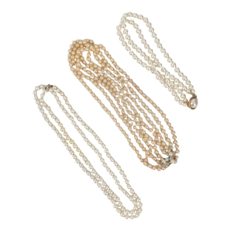 3 Vintage Costume Pearl Necklaces Incl. Carolee: 3 Vintage Costume Pearl Necklaces. Includes a Carolee double strand, 16", signed; 23", unsigned; and 48", unsigned. Condition: Good vintage condition consistent with age, use and storage. Estimate 50