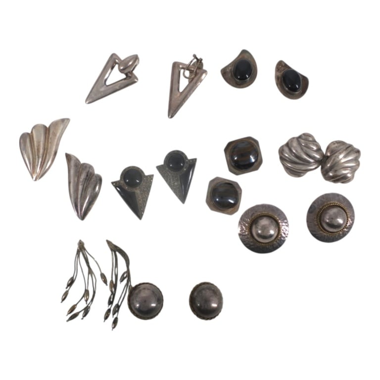 9 Pair Vintage Sterling Silver Earrings: 9 Pair Vintage Mexican Sterling Silver Earrings. Includes Taxco, Mexico, Nancy & Rise, Marcasite, gemstones. Largest pair measures 2" x 1". Total weight of lot approx. 162 grams. Condition: 1 post mis