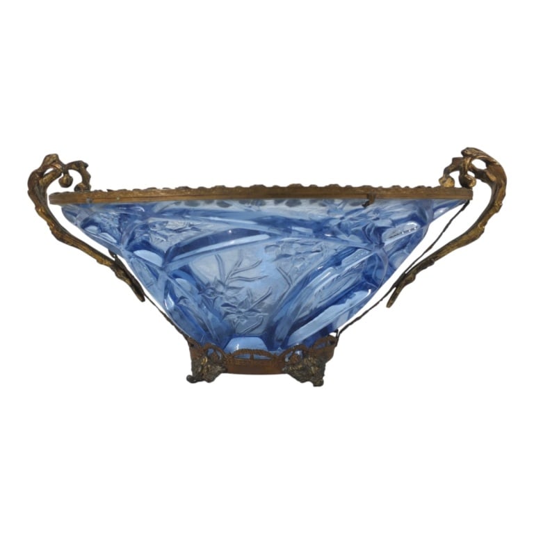 Vintage Consolidated? Bronze Mounted Centerpiece: Vintage Blue Consolidated? Glass Bronze Mounted Centerpiece Bowl. Unsigned. Measures 6-3/4" H x 15-1/2" W. Condition: Good condition, no chips or cracks. Estimate 200 - 400 Domestic shipping Third