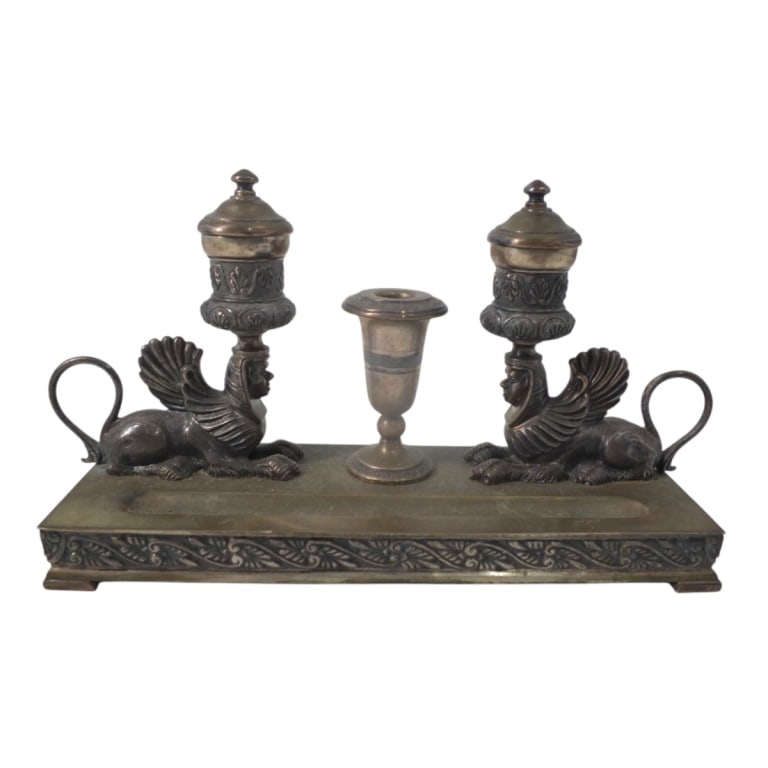 Antique Egyptian Revival Inkstand: Antique Egyptian Revival Inkstand. Unsigned. Measures 5-1/2" H x 10-1/2" W x 3". Condition: Good condition consistent with age and use. Estimate 100 - 300 Domestic shipping Third Party