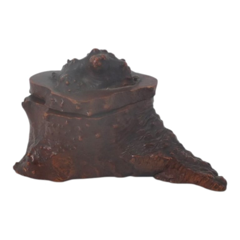 Antique Burl Wood Inkwell: The natural shape of this hand carved inkwell is a burl nodule. Glass cup inset. Unsigned. Measures 2-1/2" x 4-1/2" x 2-3/4". Condition: Some wear or in good condition consistent with age, use and