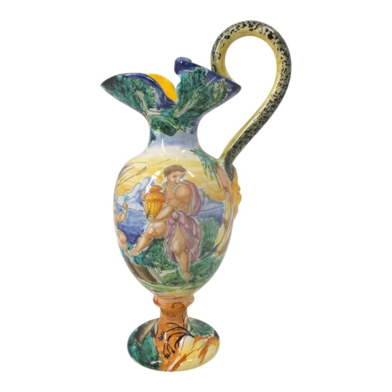 Italian Majolica Ewer: Italian Majolica Ewer. Unsigned. Measures 11-1/2" H. Condition: Good condition. Estimate 60 - 120 Domestic shipping Third Party