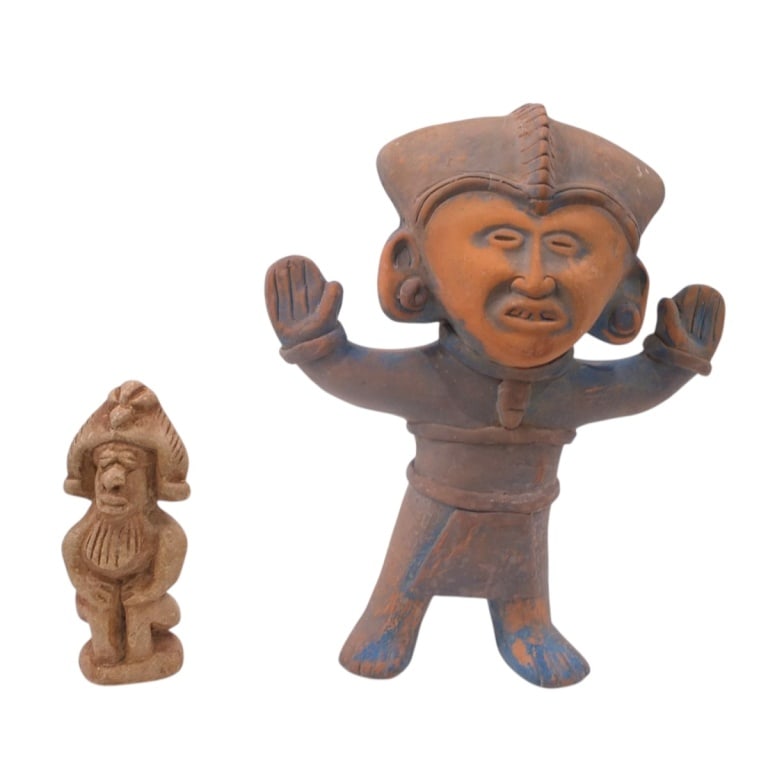2 Aztec/Mayan Terracotta & Stone Smiling Figures: Includes Terracotta Smiling Figure. Measures 12" x 9-3/4". Carved stone figure 6" H. Condition: Good condition. Estimate 100 - 300 Domestic shipping Third Party