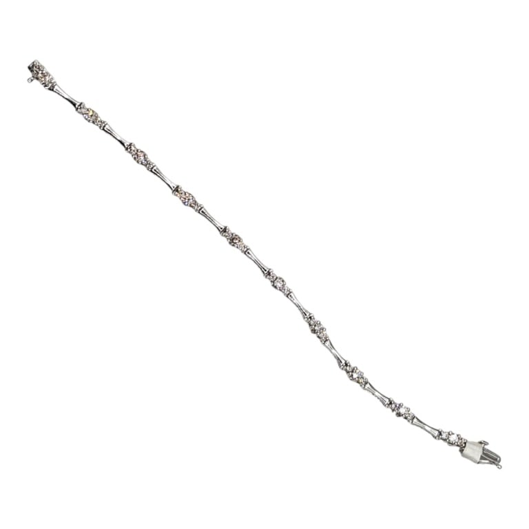 Vintage 14K & Diamond Bracelet: Vintage 14 Karat White Gold and Diamond Bracelet. Stamped. 1.5 TCW H -J SI - S2 Measures 7" L. Approx. weight: 10.3 grams. Please note: Due to increased fraudulent activity, customers without an