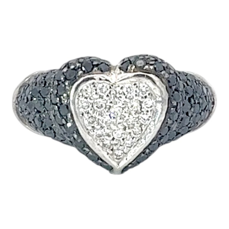 14K Black & White Diamond Ring: 14 Karat White Gold Black and White Diamond Heart Shape Ring. Stamped. Size: 6-1/2. Approx. weight: 5.7 grams. Please note: Due to increased fraudulent activity, customers without an established