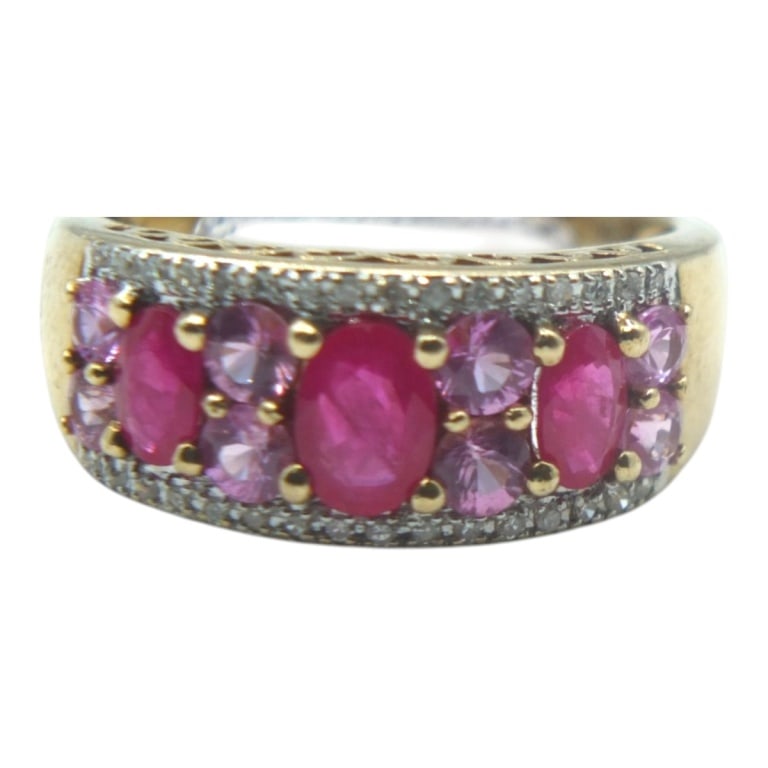 Vintage 10K Diamond, Ruby and Sapphire Ring: Vintage 10 Karat Yellow Gold Diamond, Ruby and Pink Sapphire Ring. Size: 7. Approx. weight: 3.9 grams. Please note: Due to increased fraudulent activity, customers without an established bidding