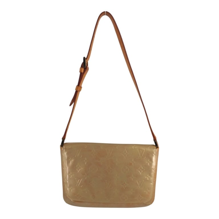 Louis Vuitton Monogram Vernis Thompson Street Bag: Louis Vuitton Monogram Beige Vernis Thompson Street Bag. Tan leather strap and piping, gold tone hardware, beige leather interior. Embossed label. Measures 7-1/2" x 10-1/2" x 1". Condition: Light soil