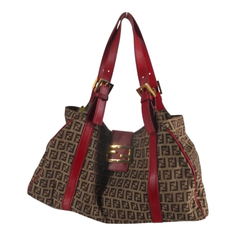 Fendi Beige/Red Zucchino Canvas Shoulder Bag: Fendi Beige/Red Zucchino Monogram Canvas Shoulder Bag. Red canvas interior with zippered pocket and adjustable straps. Gold tone hardware. Labeled appropriately, leather tab inside pocket with #3107-8