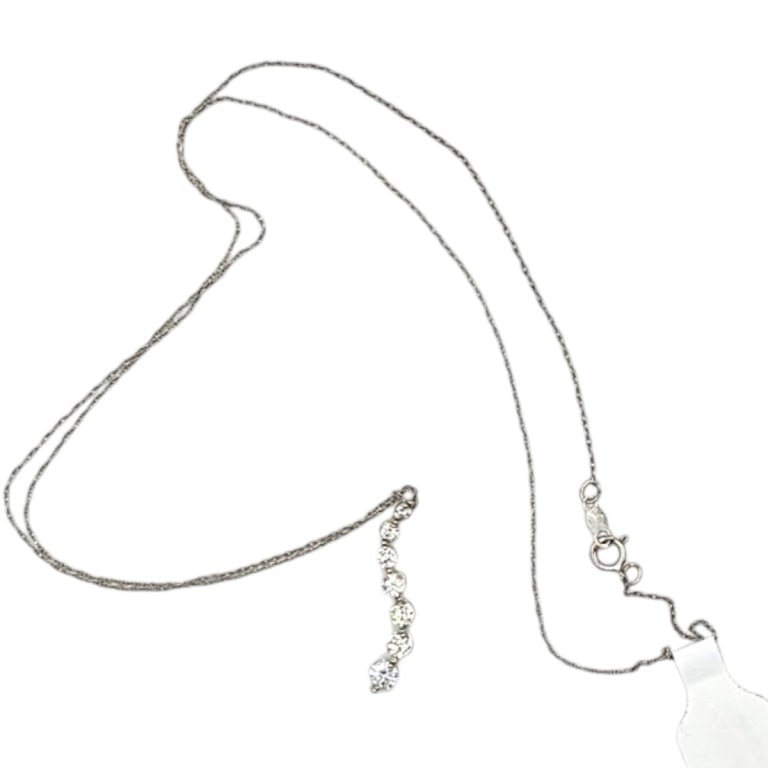 Vintage 14K & Diamond Pendant w/ Necklace: Vintage 14 Karat White Gold and Diamond Drop Pendant with Necklace. .45 TCW. Measures 16" L. Approx. weight: 1.5 grams. Please note: Due to increased fraudulent activity, customers without an establis