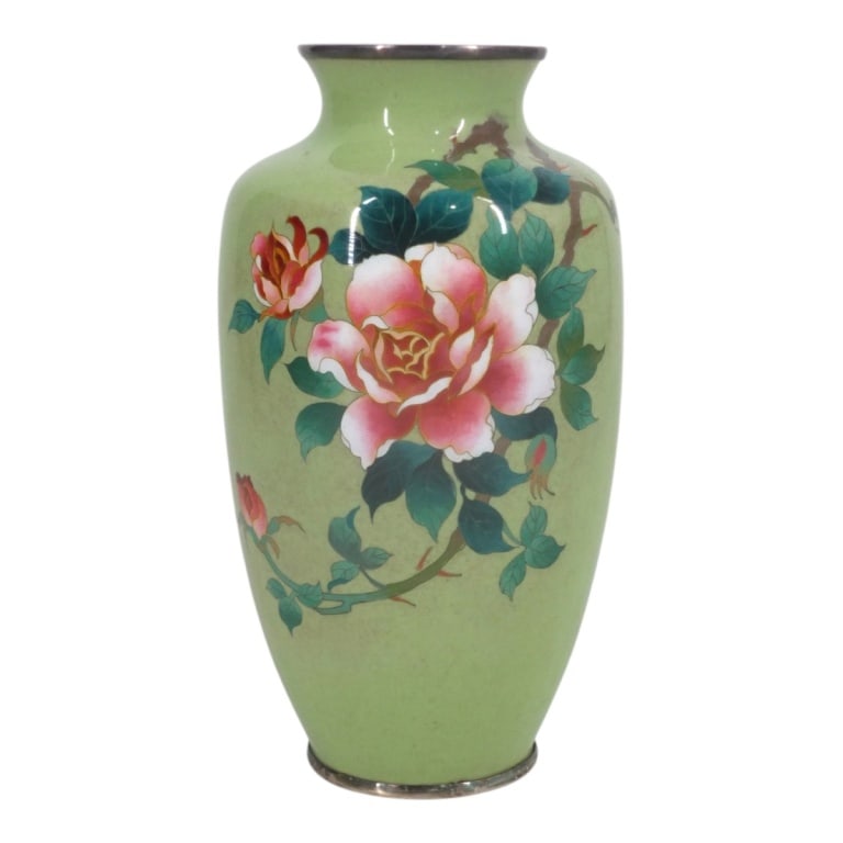 Signed Vintage Japanese Cloisonne Vase: Vintage Japanese Cloisonne Vase. Pretty floral motif on light green ground. Signed on bottom: Z or 2 or N in a circle. Measures 7-1/4" H. Condition: Good condition. Estimate 80 - 160 Domestic