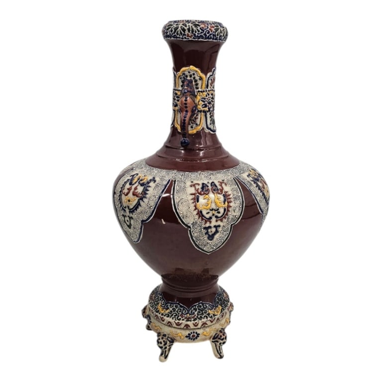 Vintage Japanese? Moriage Footed Urn: Vintage Japanese? Moriage Enameled Ceramic Urn. The baluster form with figural handles on 5 feet. Signed. Measures 17-1/4" x 8-1/2". Condition: Repair to 1 foot. Estimate 160 - 320 Domestic shipping T