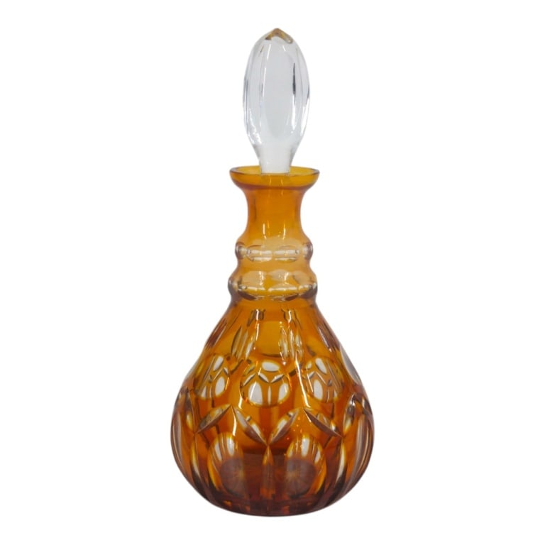 Vintage Czech Amber Cut to Clear Crystal Decanter: Vintage Czech Amber Cut to Clear Crystal Decanter. Unsigned. Measures 12" H. Condition: Good condition. Estimate 60 - 120 Domestic shipping Third Party