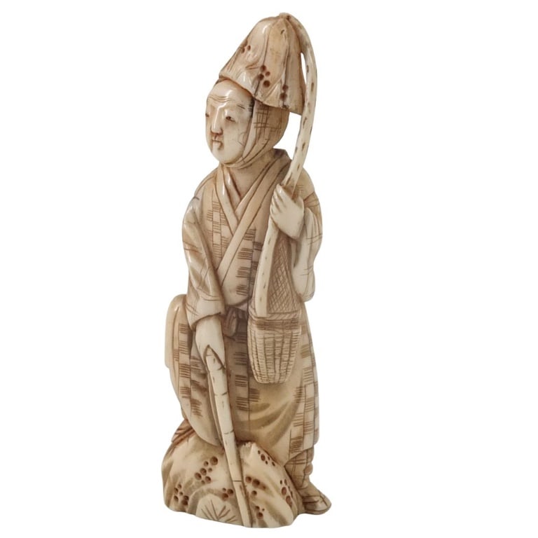 Antique Japanese Carved Figurine: Antique Japanese Polychrome Carved Fisherman Figurine. Unsigned. Measures 3-3/4" x 1-1/4". Please note; this lot contains material which may be subject to state or import/export restrictions.