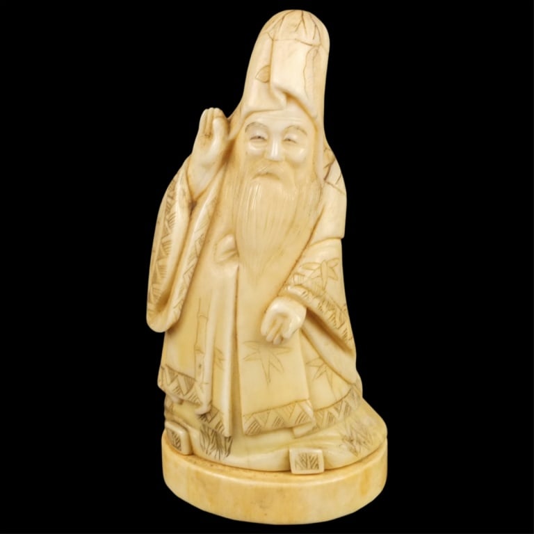Antique Japanese Carved Immortal Figurine: Antique Japanese Polychrome Carved Immortal Figurine. Signed on the base. Measures 3-1/2" x 1-5/8". Please note; this lot contains material which may be subject to state or import/export