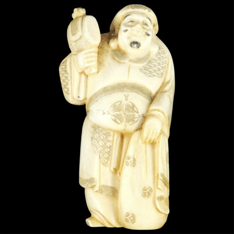 Antique Japanese Immortal Figurine: Antique Japanese Polychrome Carved Immortal Figurine. Signed on the base. Measures 3-1/8" x 1-1/2". Please note; this lot contains material which may be subject to state or import/export