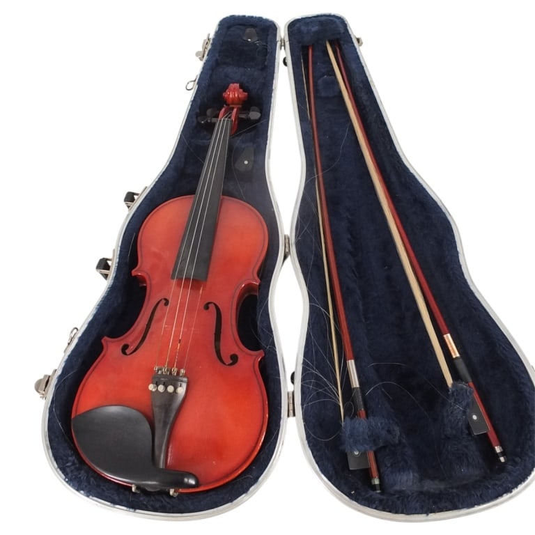 Vintage Violin by Twinkle with Case: Vintage Violin by Twinkle with Case. Two bows to accompany the lot. Violin measures 24" x 8-1/4". Case measures 31" x 11-1/2" x 6-1/2". Condition: Bow strings are loose otherwise good condition.