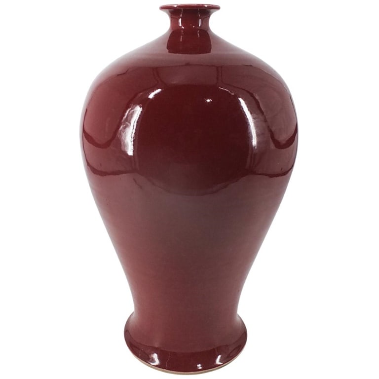 Large Chinese Porcelain Vase: Large Chinese Oxblood Glazed Porcelain Vase. Unmarked. Measures 17" x 10". Condition: Two small hairlines to the base. Estimate 50 - 150 Domestic shipping Third party
