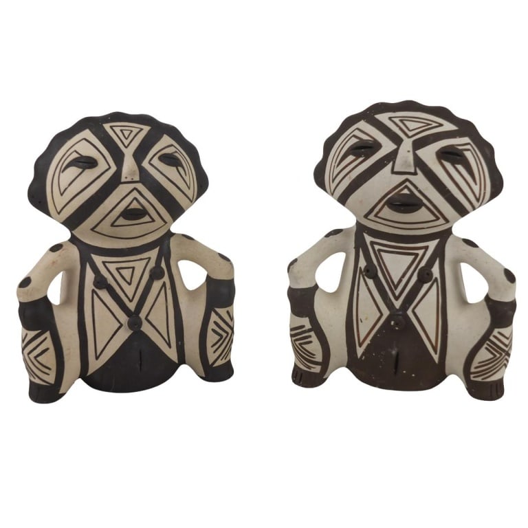 Pair of Native American Figurines: Pair of Vintage Native American Ceramic Fertility Figurines with Rattles. One figure is signed on the base. Measures 6-7/8" x 5-1/4". Condition: Good condition. Estimate 20 - 60 Domestic shipping