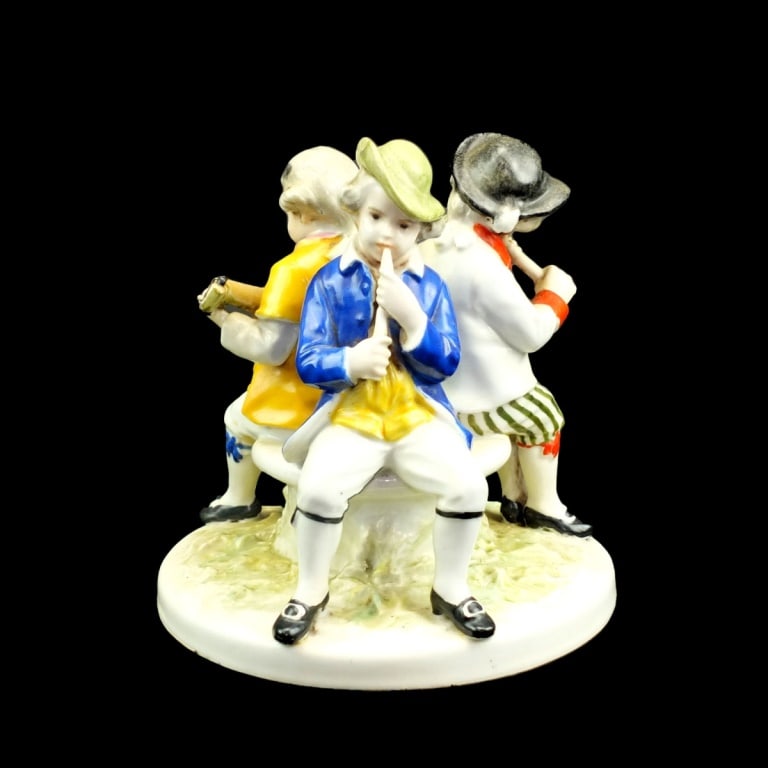 Antique Karl Ens Volkstedt Figurine: Antique Karl Ens Volkstedt Porcelain Musician Figurine. Signed on the base. Measures 5-1/4" x 5-1/2" diam. Condition: Good condition. Estimate 50 - 150 Domestic shipping Third party