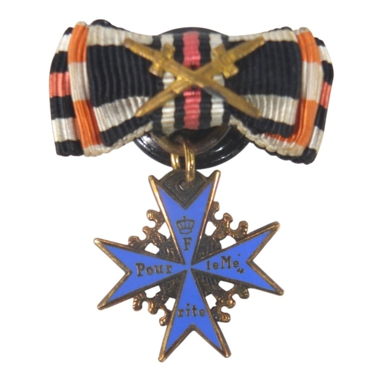 German WWI Miniature Pour Le Merite Blue Max Pin: RARE Imperial German WWI Miniature Pour Le Merite Blue Max Lapel Decoration. Reads Pour Le Merite on the other three arms. Reverse is blank with enamel. Measures 13/16" x 13/16". Please be advised: