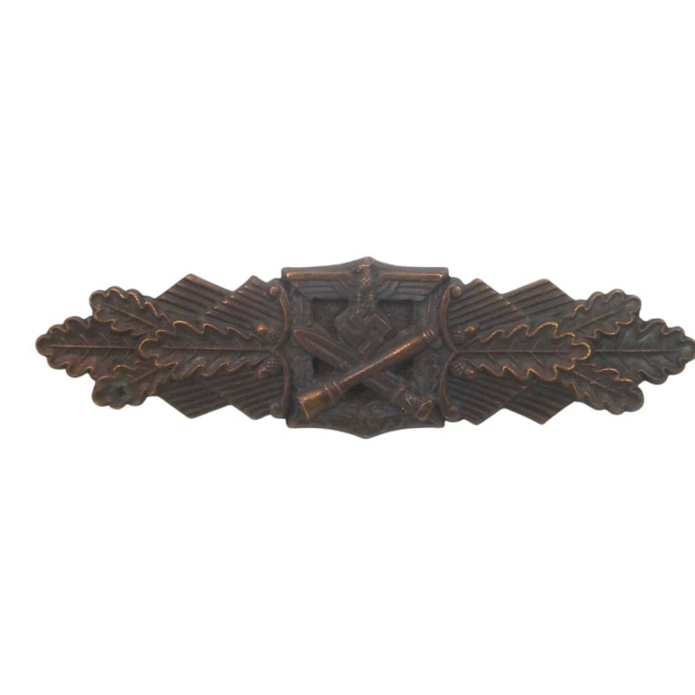 German WWII Bronze Close Combat Clasp: German WWII Bronze Close Combat Clasp. Marked W.E. Peekhaus Berlin to back side. Measures 3-3/4" L. Please be advised: This item has not been authenticated by an independent expert, and the seller