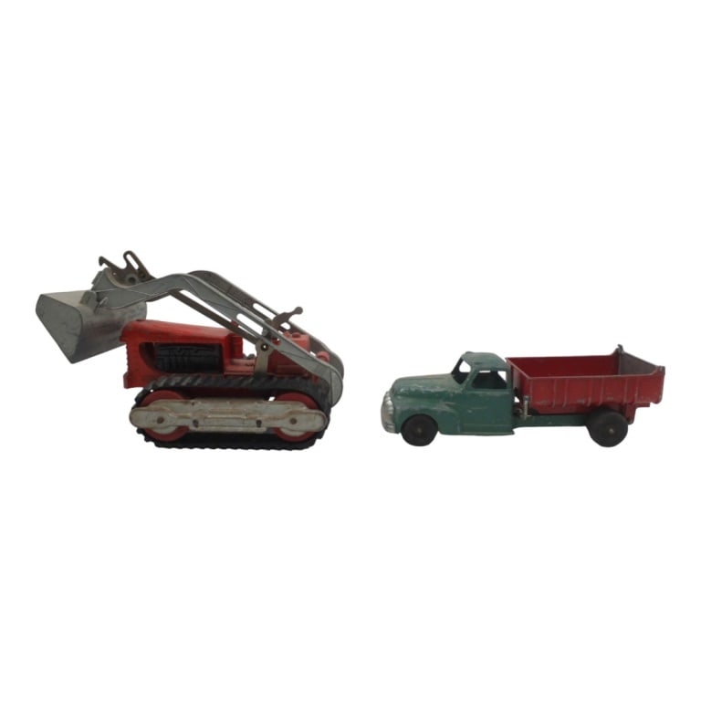 2 1950's Hubley Toy Trucks: 1950's Steel Hubley #505 Front Loader Bulldozer and Kiddie Toy Dump Truck. Condition: AS IS condition, with wear consistent with wear, use and storage. Estimate 80 - 160 Domestic shipping Third Party