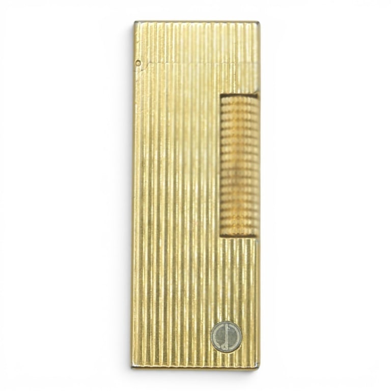 Vintage Dunhill Rollagas Lighter: Vintage Dunhill Rollagas Gold Plated Lighter. Stamped. Measures 2-3/4". Please note; We do not guarantee that all parts are present or in working condition. Condition: Good condition. Estimate 200 -